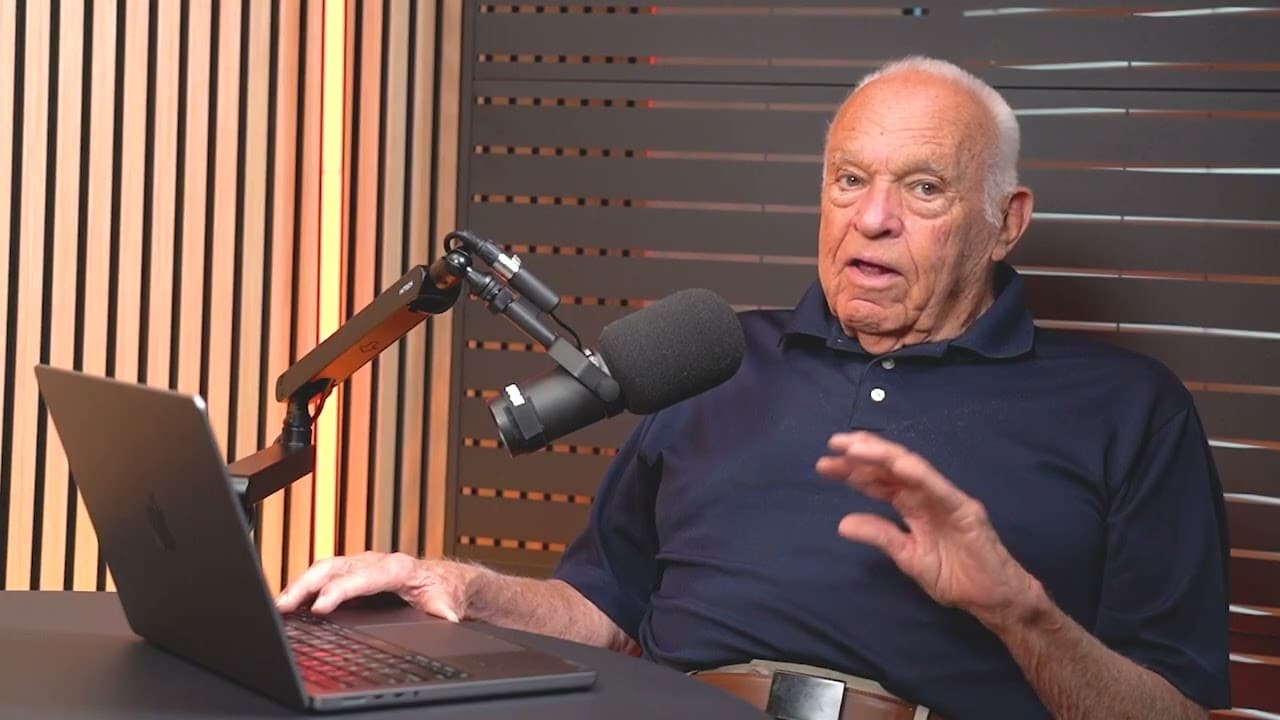 Dr. Lanny Johnson, MD, recording Orthopodcast in the studio